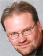 A portrait of David Melton.